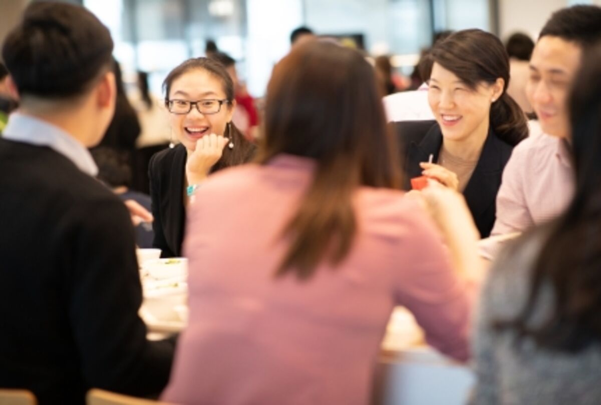 A group of people having a meeting