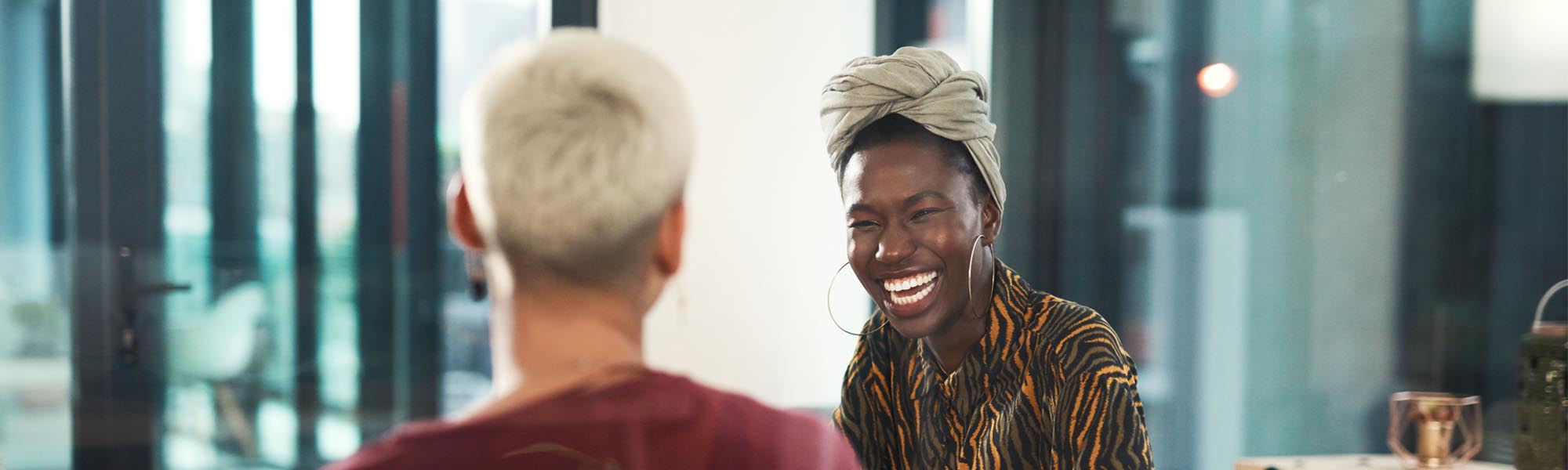 Two people laughing together