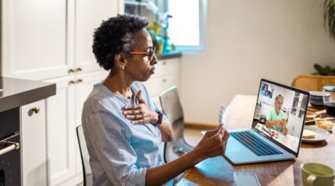 Patient with healthcare professional on video call